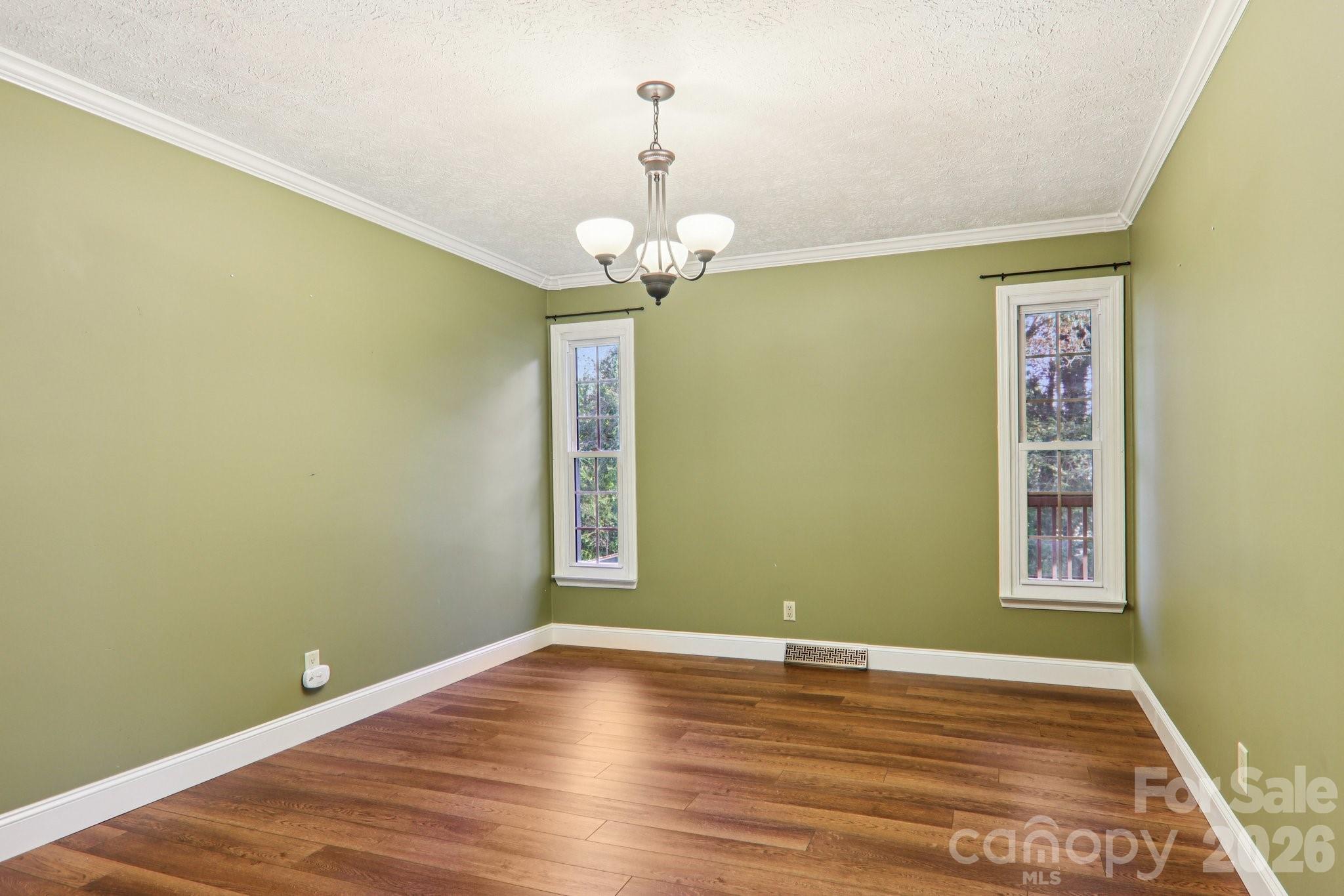 261 Eastview Road Brevard, NC 28712 - Photo 10 of 15 a view of empty room with wooden floor