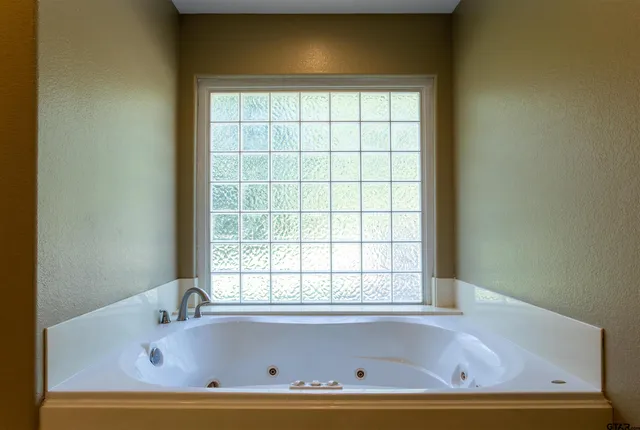 a bathroom with a bathtub
