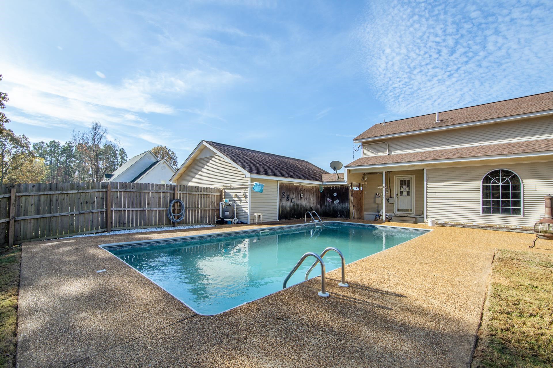345 Dancer Road Selmer, TN 38375 - Photo 24 of 24 View of swimming pool with a patio area