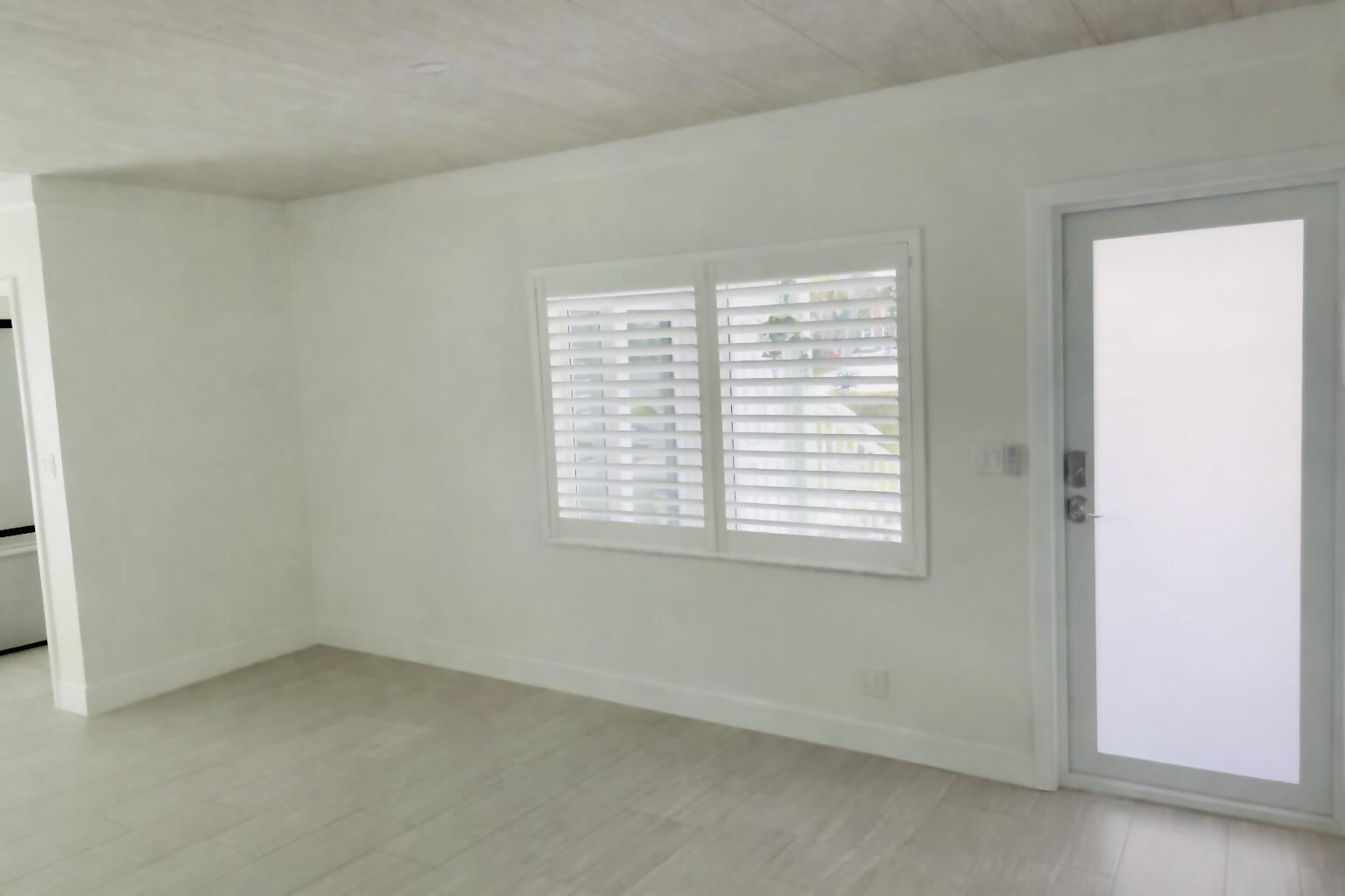 2100 Northeast 38th Street, Unit 142 Lighthouse Point, FL 33064 - Photo 15 of 42 Living room (2)