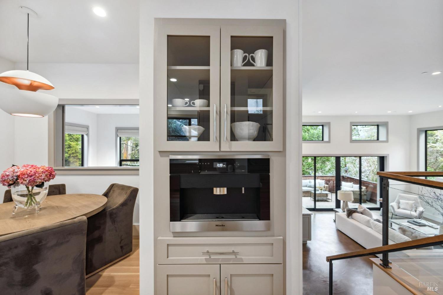 23 Janes Street Mill Valley, CA 94941 - Photo 12 of 32 a kitchen with a stove cabinets and a table