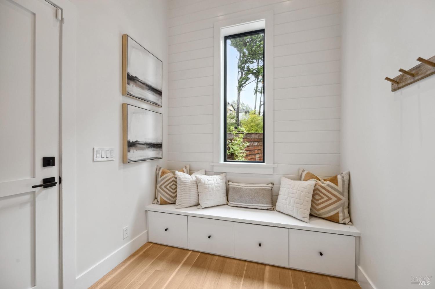 23 Janes Street Mill Valley, CA 94941 - Photo 18 of 32 a living room with furniture and a window