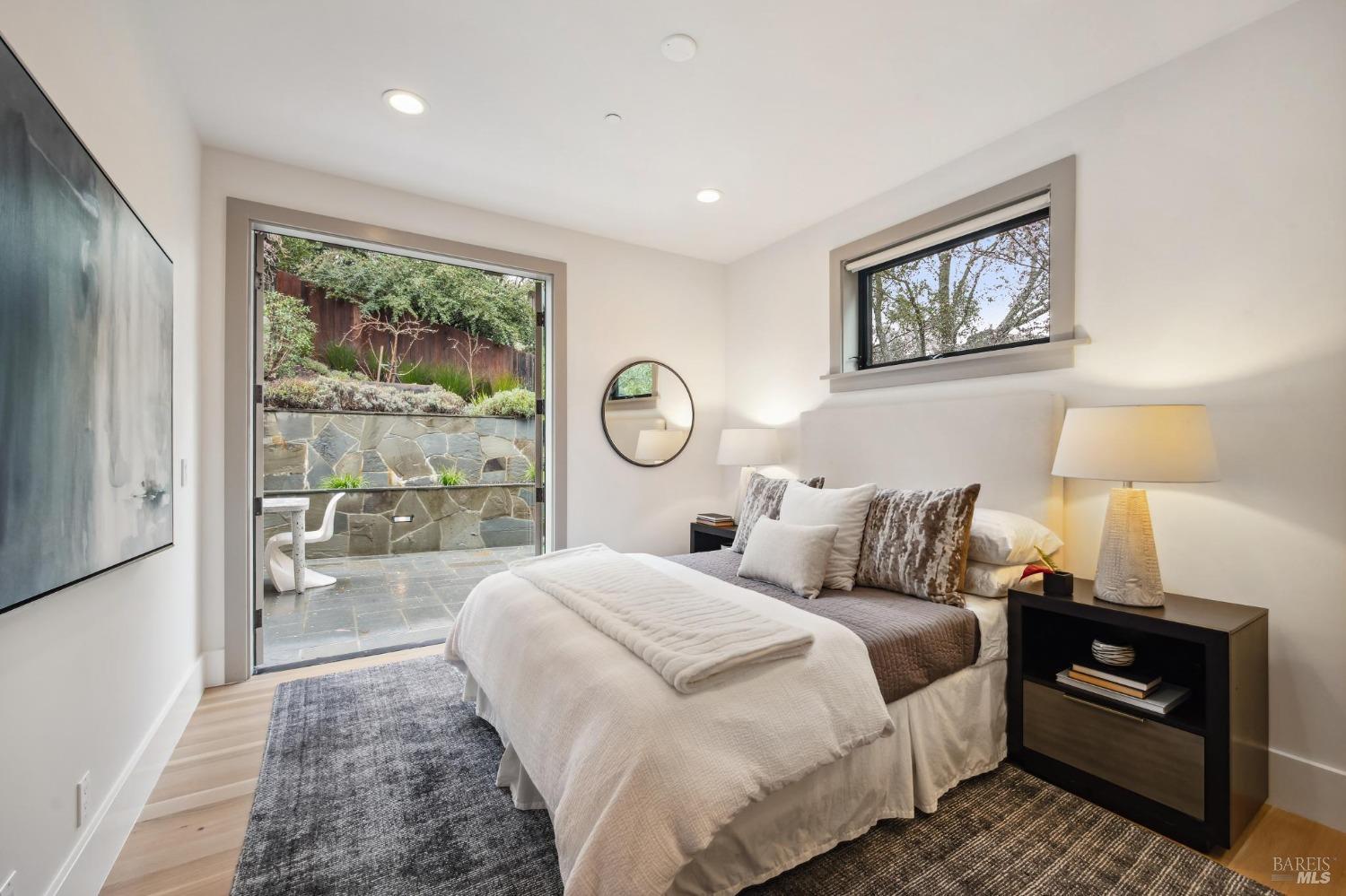 23 Janes Street Mill Valley, CA 94941 - Photo 19 of 32 a bedroom with double bed and a window