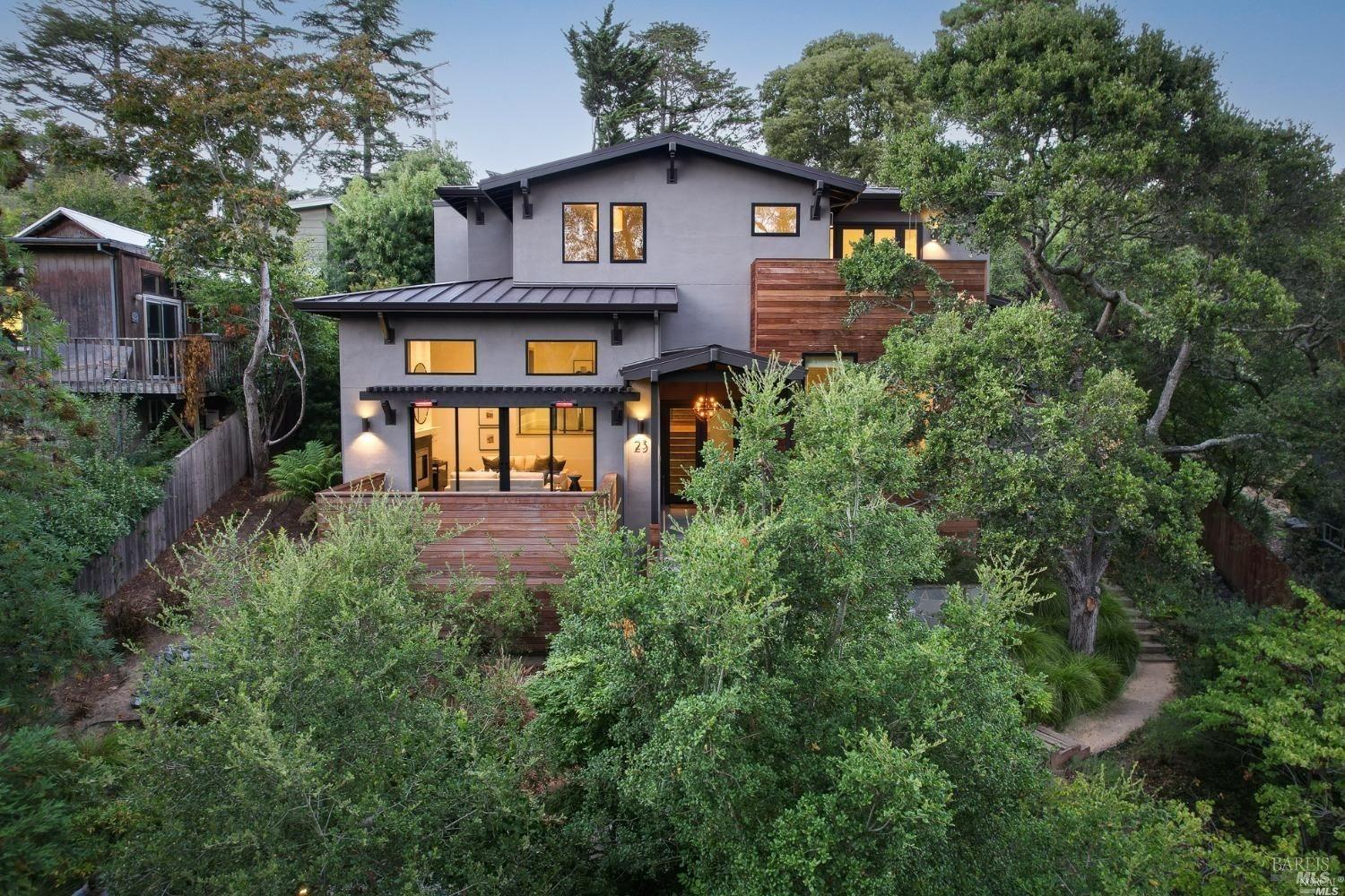 23 Janes Street Mill Valley, CA 94941 - Photo 2 of 32 a front view of a house with balcony and trees
