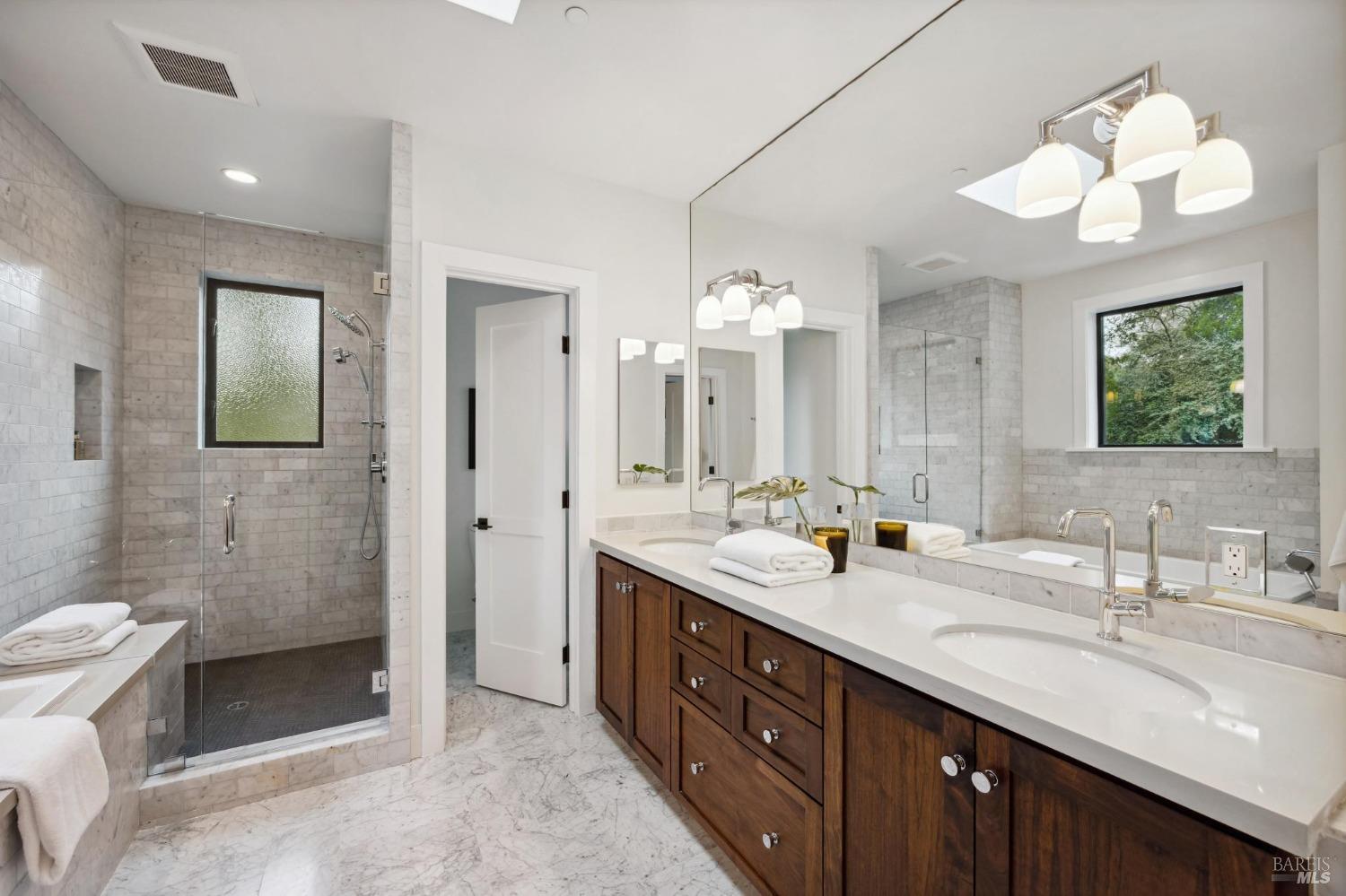 23 Janes Street Mill Valley, CA 94941 - Photo 24 of 32 a bathroom with double sink and a mirror