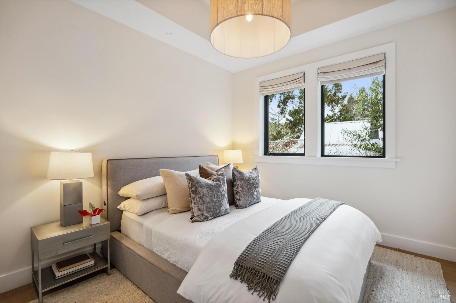 23 Janes Street Mill Valley, CA 94941 - Photo 26 of 32 a bedroom with a bed and a window