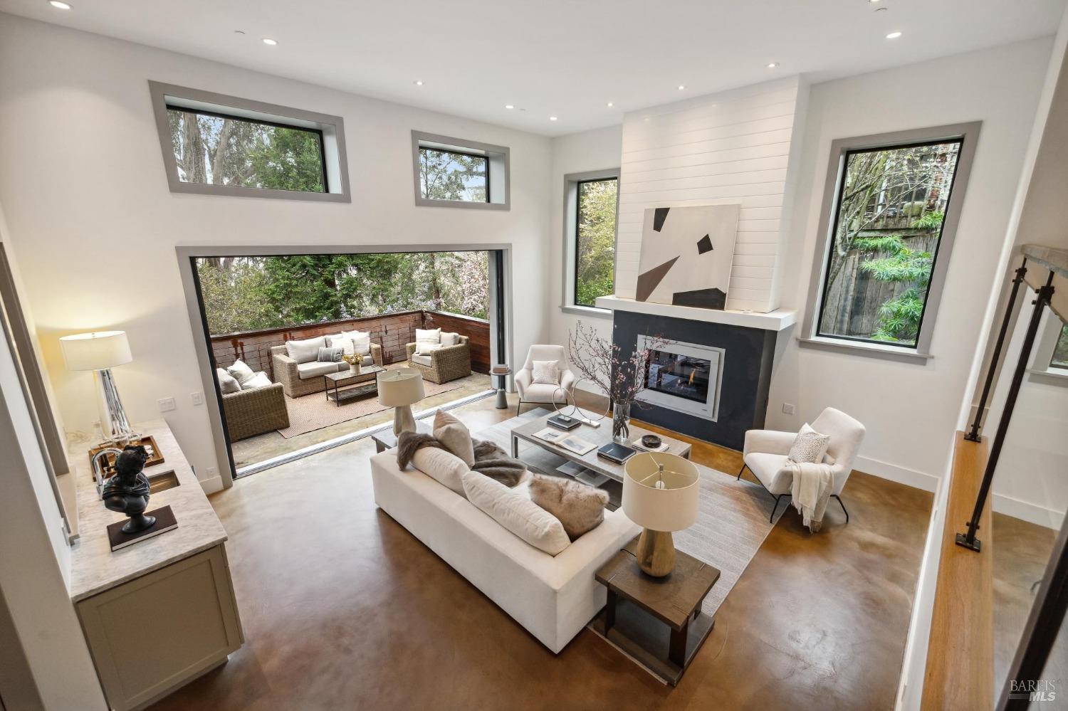 23 Janes Street Mill Valley, CA 94941 - Photo 3 of 32 a living room with furniture and a flat screen tv