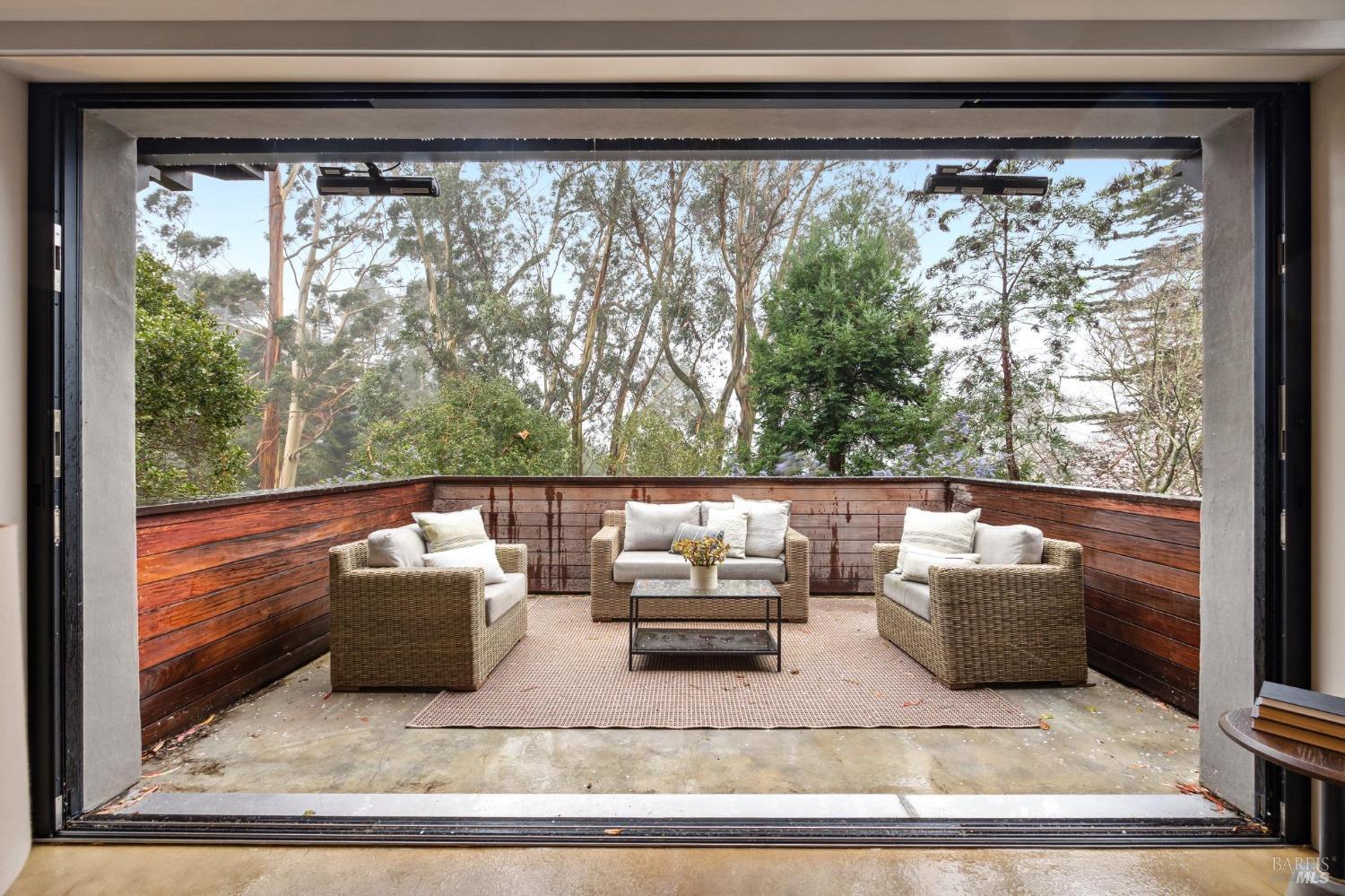 23 Janes Street Mill Valley, CA 94941 - Photo 6 of 32 a living room with furniture and a floor to ceiling window