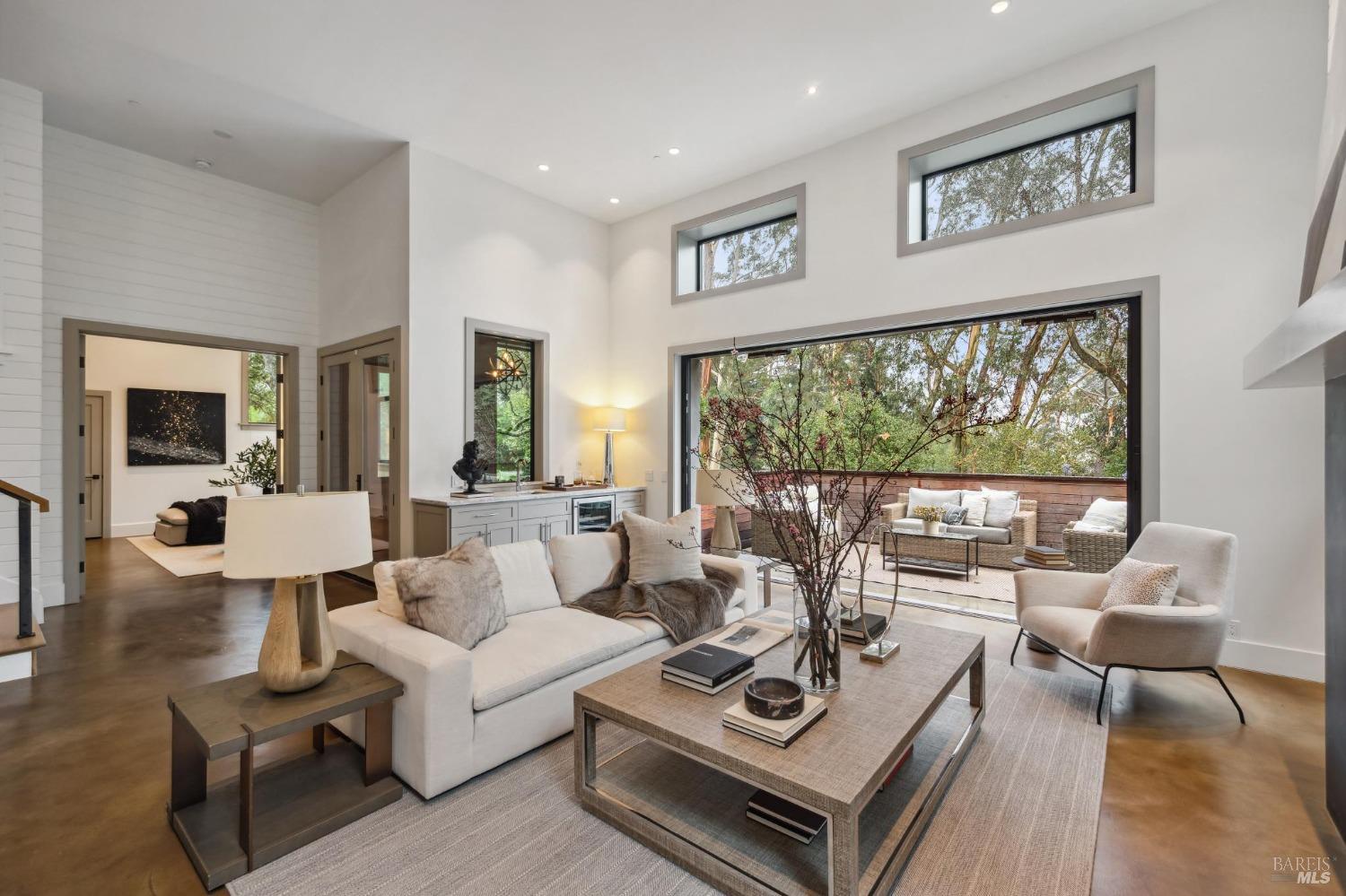 23 Janes Street Mill Valley, CA 94941 - Photo 7 of 32 a living room with furniture large window and a table