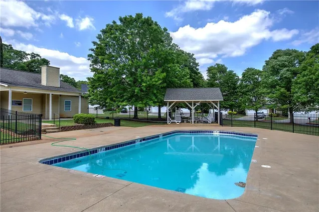 a view of a swimming pool and outdoor space