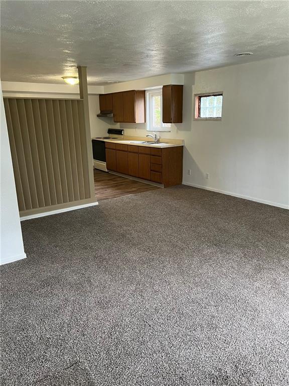 544 Old Frankstown Road Monroeville, PA 15146 - Photo 11 of 12 a living room with stainless steel appliances kitchen island furniture and a kitchen view