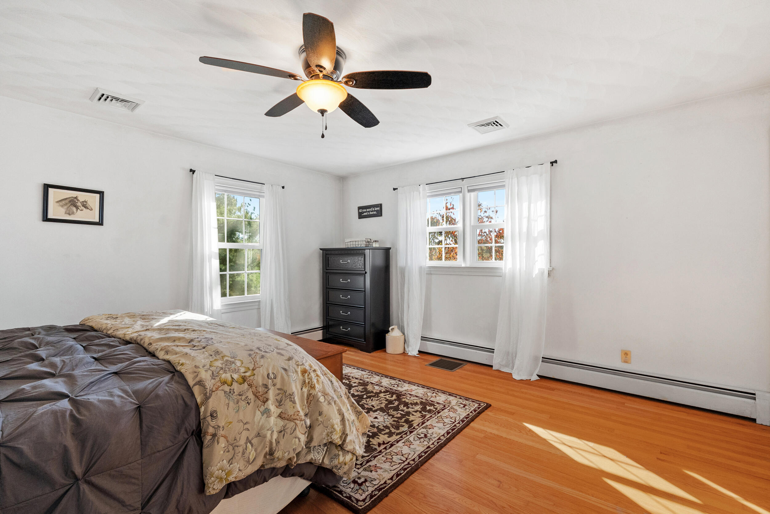 2631 Meadors Spur Road Moneta, VA 24121 - Photo 28 of 87 a bedroom with a bed ceiling fan and a window