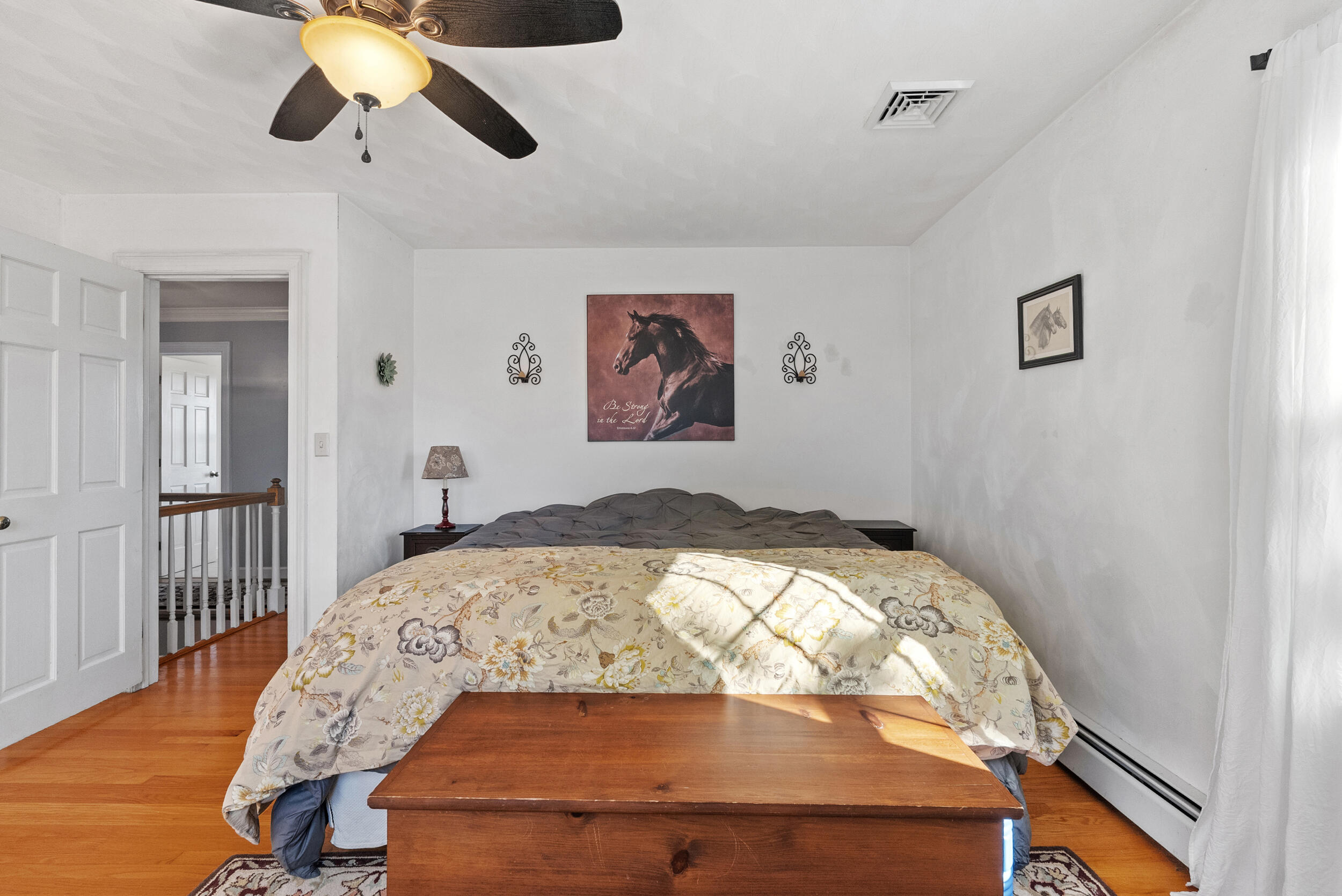2631 Meadors Spur Road Moneta, VA 24121 - Photo 29 of 87 a bedroom with a bed and wooden floor