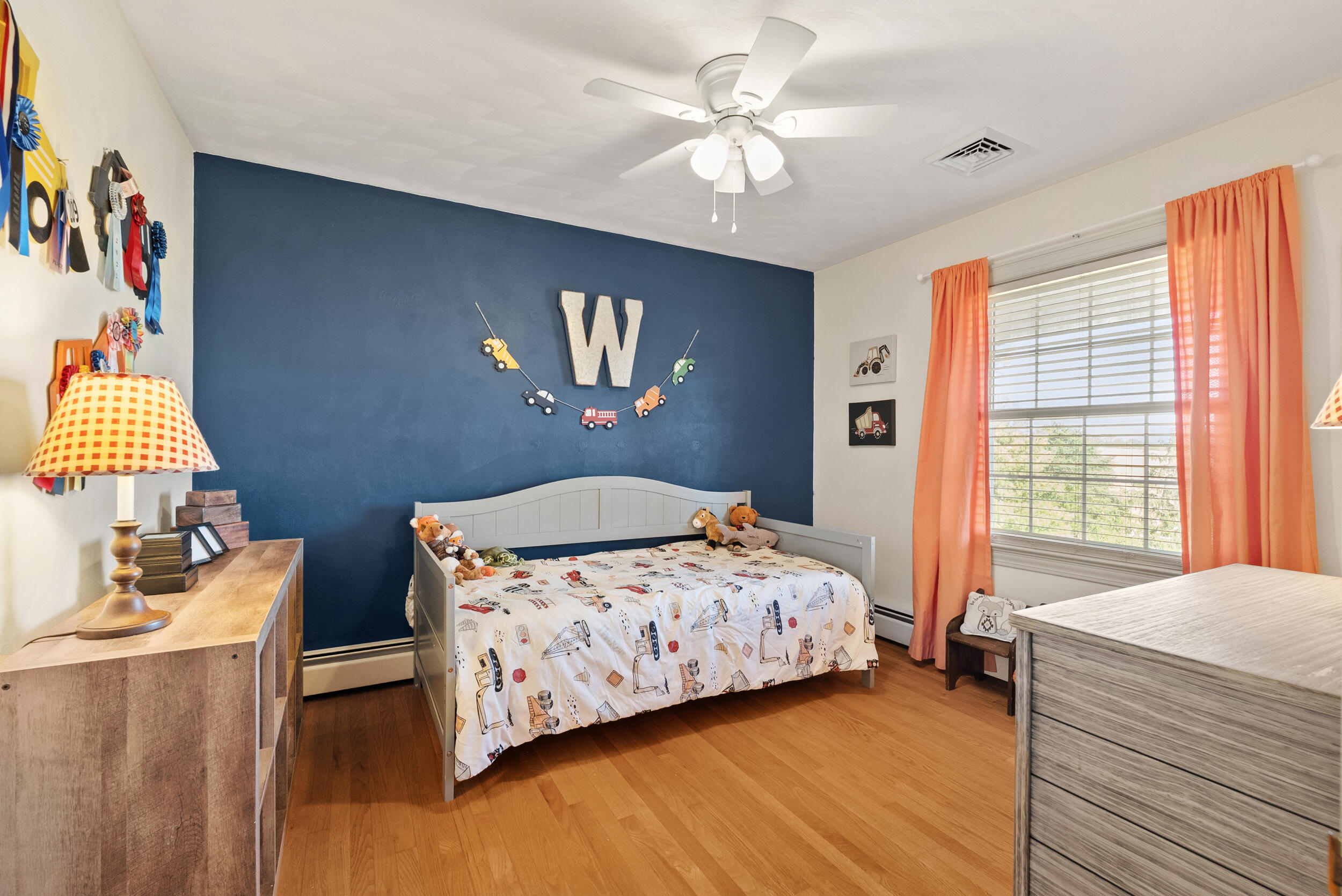 2631 Meadors Spur Road Moneta, VA 24121 - Photo 34 of 87 a bedroom with a bed and a chandelier