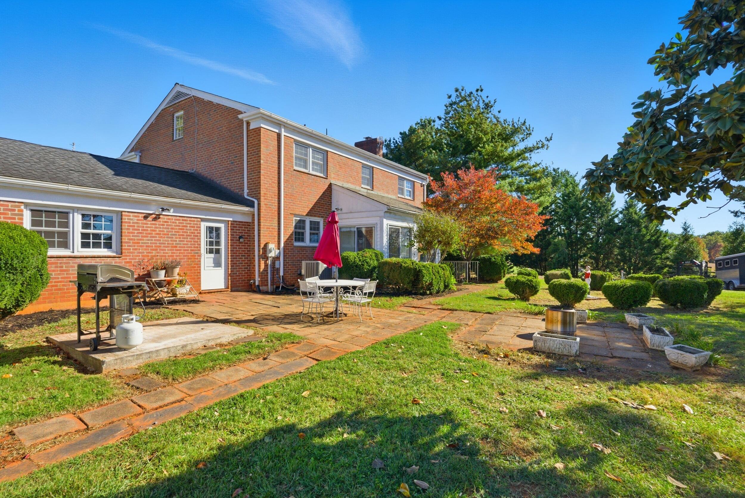 2631 Meadors Spur Road Moneta, VA 24121 - Photo 44 of 87 a front view of house with yard and outdoor seating