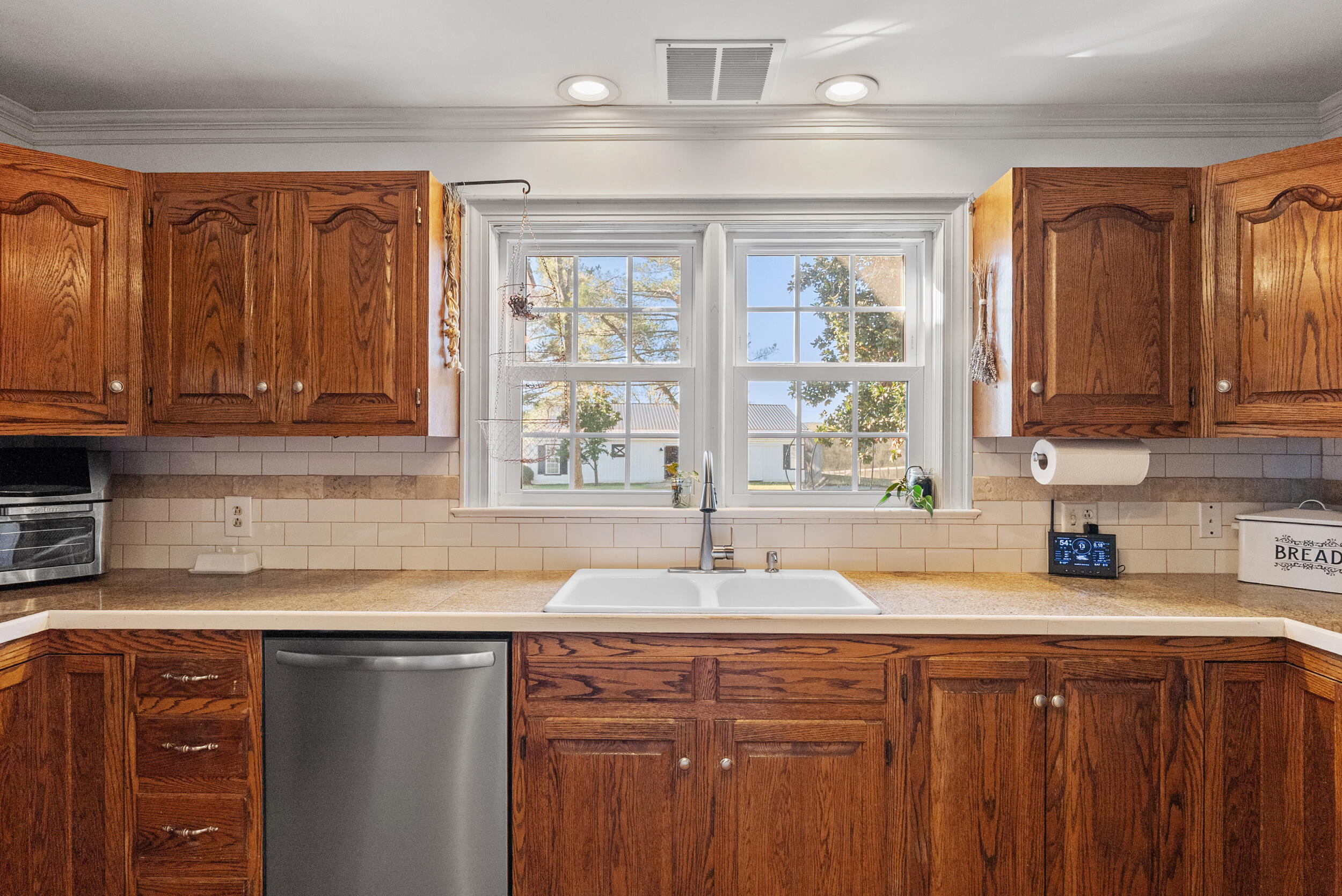 2631 Meadors Spur Road Moneta, VA 24121 - Photo 5 of 87 a kitchen with stainless steel appliances granite countertop a sink dishwasher stove and cabinets with wooden floor