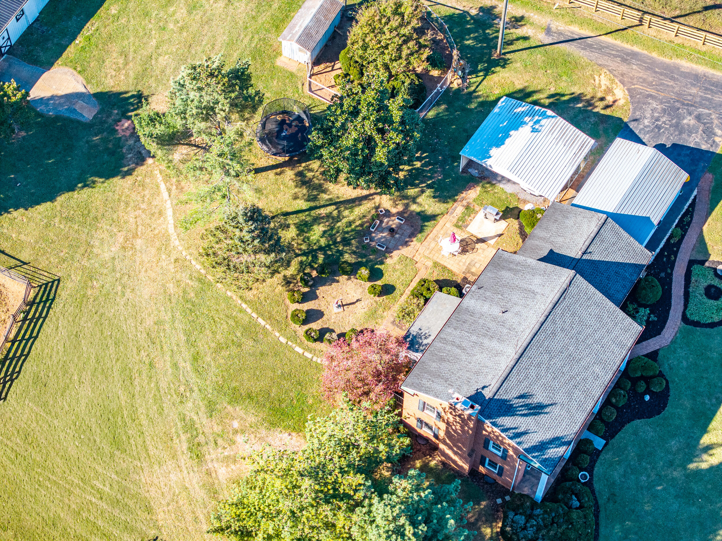2631 Meadors Spur Road Moneta, VA 24121 - Photo 77 of 87 an aerial view of a house with a yard and garden