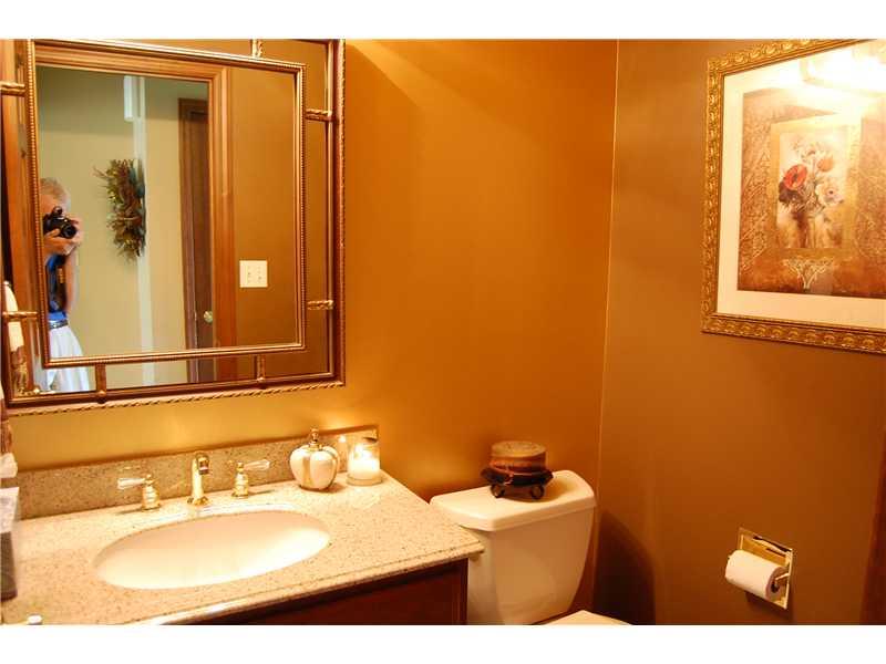 255 Logan Road Gibsonia, PA 15044 - Photo 14 of 23 Partial Bath. 1ST FLOOR POWDER ROOM FEATURES A CUSTOM VANITY & GRANITE COUNTER