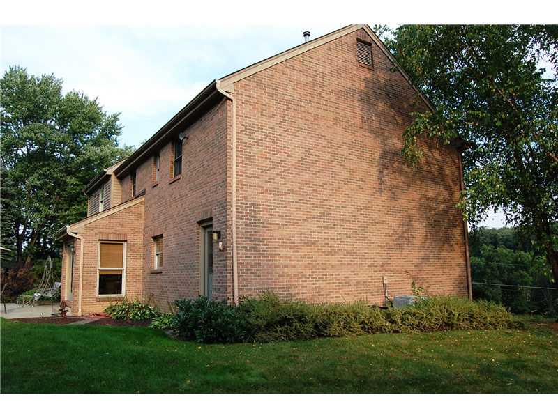 255 Logan Road Gibsonia, PA 15044 - Photo 21 of 23 Exterior Back. * THE EXTERIOR OF THE HOME IS MOSTLY BRICK