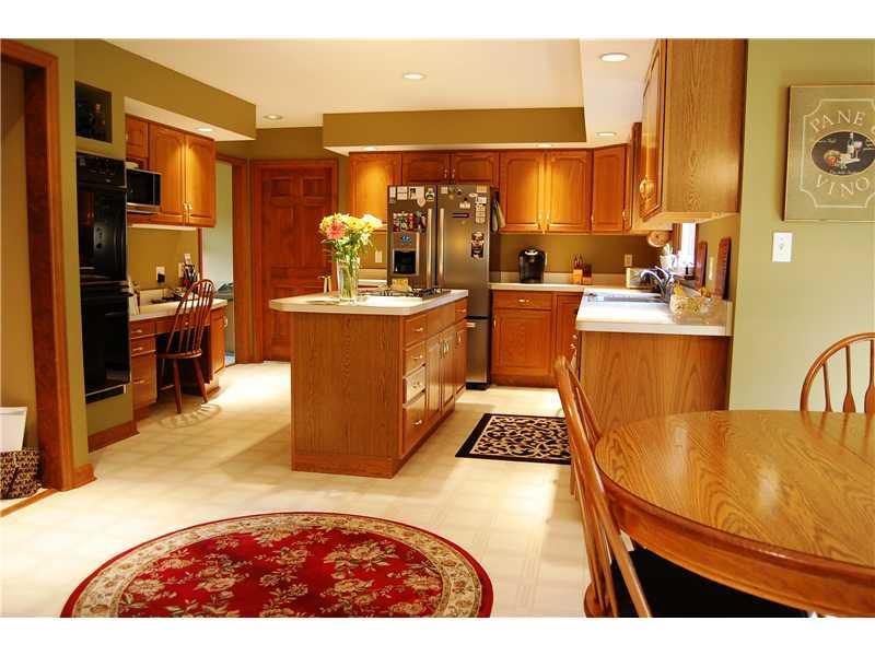 Kitchen. *A COOK"S DREAM KITCHEN. *CUSTOM CABINETRY *BUILT-IN DESK AREA *WALK-IN PANTRY