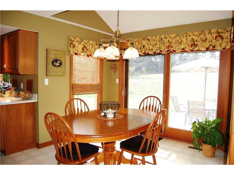 255 Logan Road Gibsonia, PA 15044 - Photo 9 of 23 Kitchen. *CHARMING BREAKFAST ROOM WITH VAULTED CEILING & SLIDING DOOR TO THE PATIO