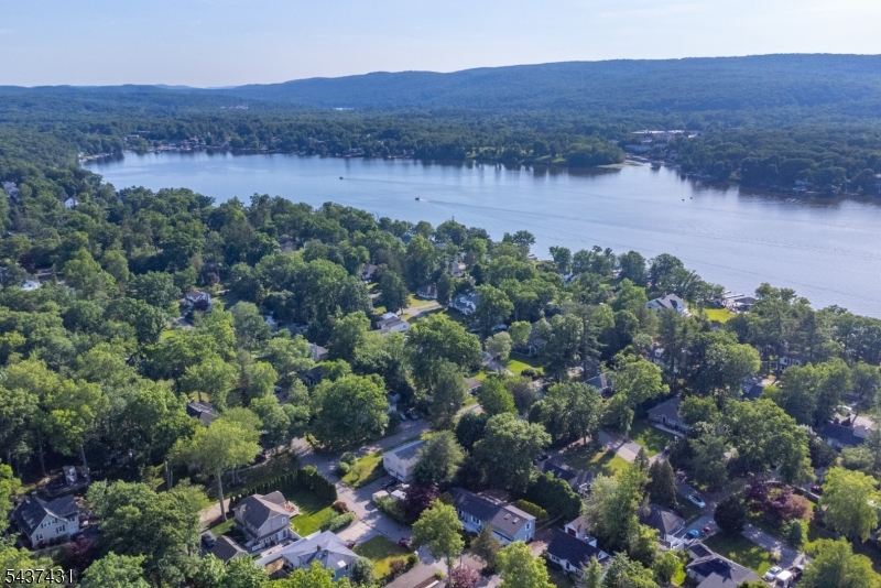 20 Wanaque Road West Milford, NJ 07421 - Photo 28 of 31 an aerial view of a houses with a lush green hillside