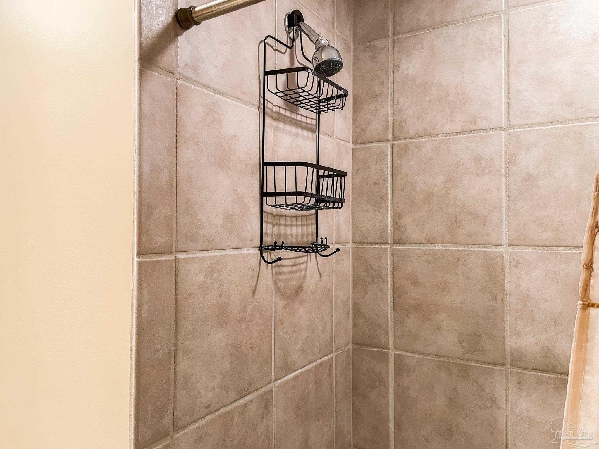 608 Lost Key Drive, Unit 604C Perdido Key, FL 32507 - Photo 25 of 38 a bathroom with a shower