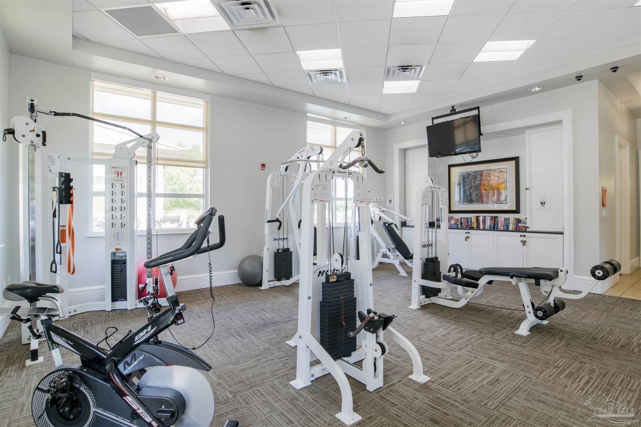 608 Lost Key Drive, Unit 604C Perdido Key, FL 32507 - Photo 37 of 38 a view of a room with gym equipment