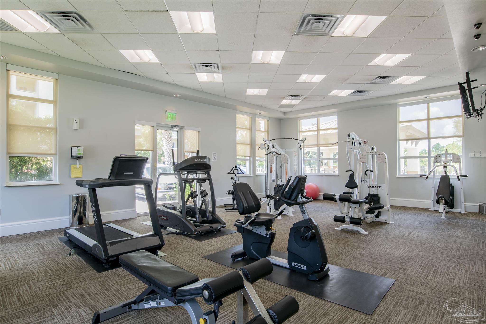 608 Lost Key Drive, Unit 604C Perdido Key, FL 32507 - Photo 38 of 38 a room with gym equipment and a large window