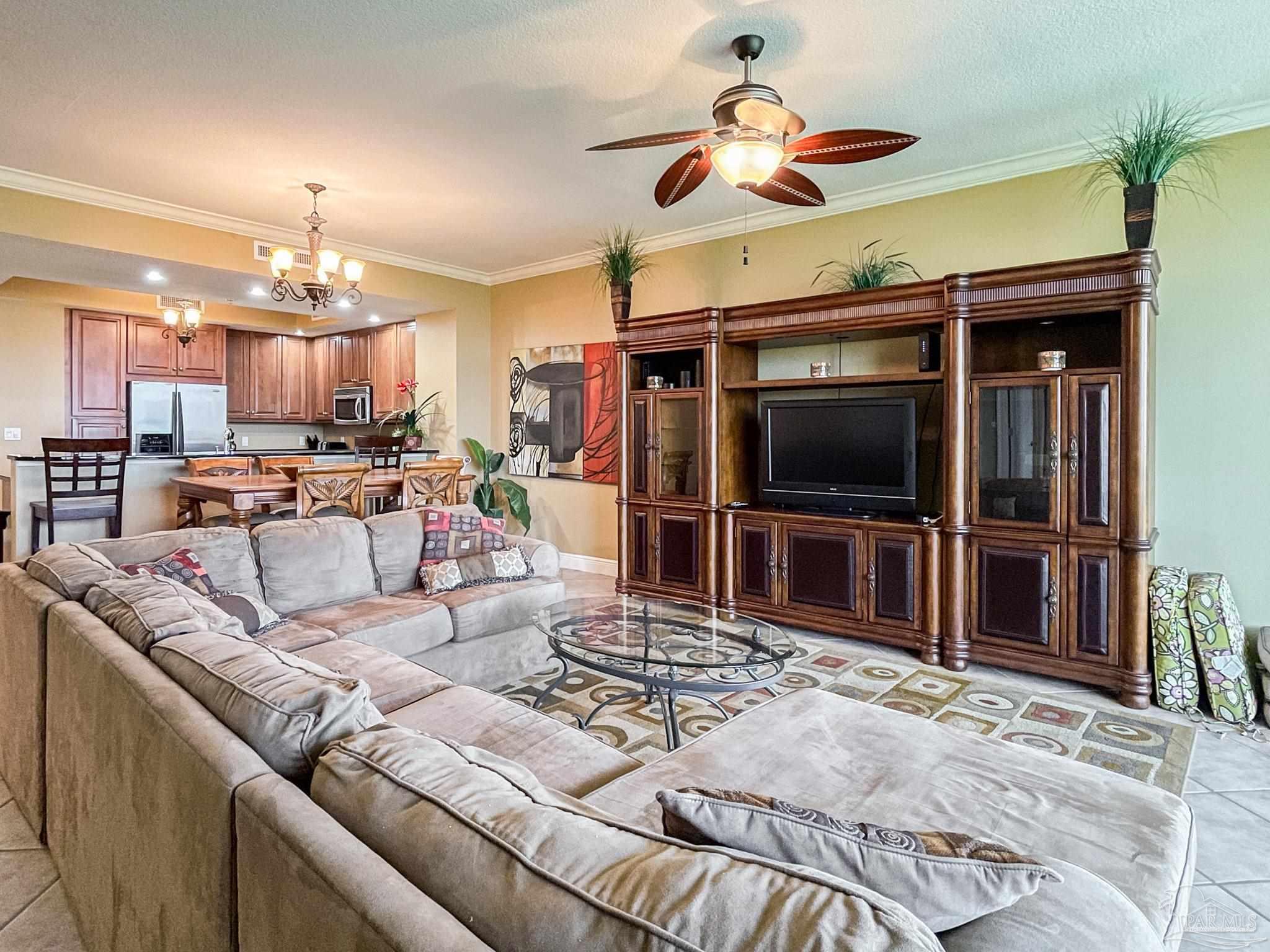 608 Lost Key Drive, Unit 604C Perdido Key, FL 32507 - Photo 9 of 38 a living room with furniture and a flat screen tv