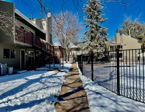a view of street with sitting area