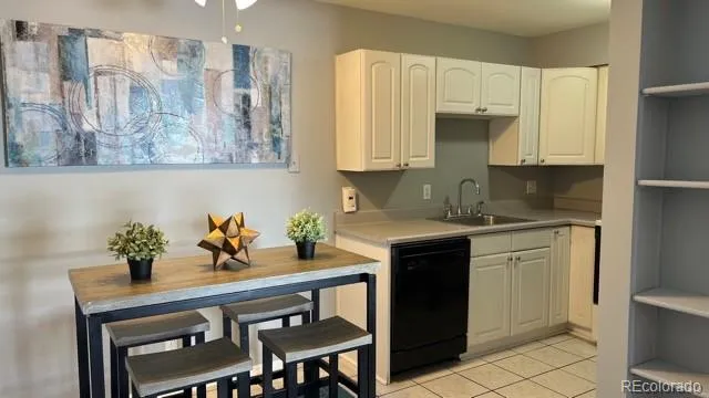 a kitchen with stainless steel appliances cabinets a sink and a stove