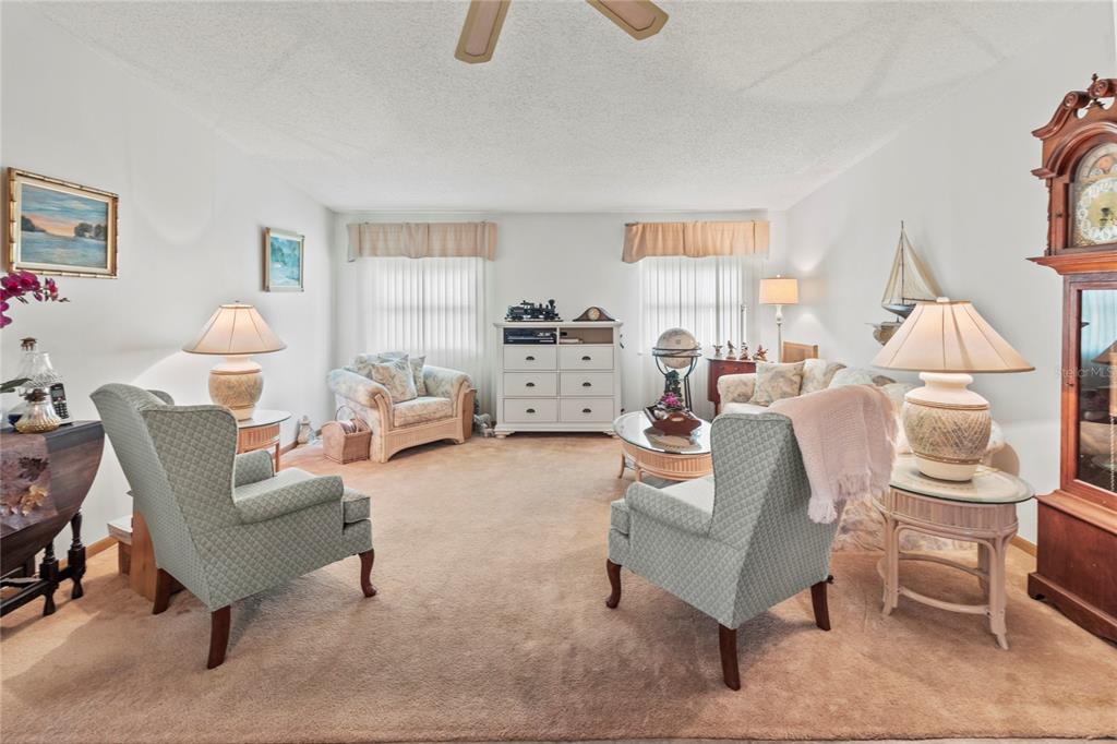 83 Eagle Circle Ellenton, FL 34222 - Photo 7 of 60 a living room with furniture and a large window