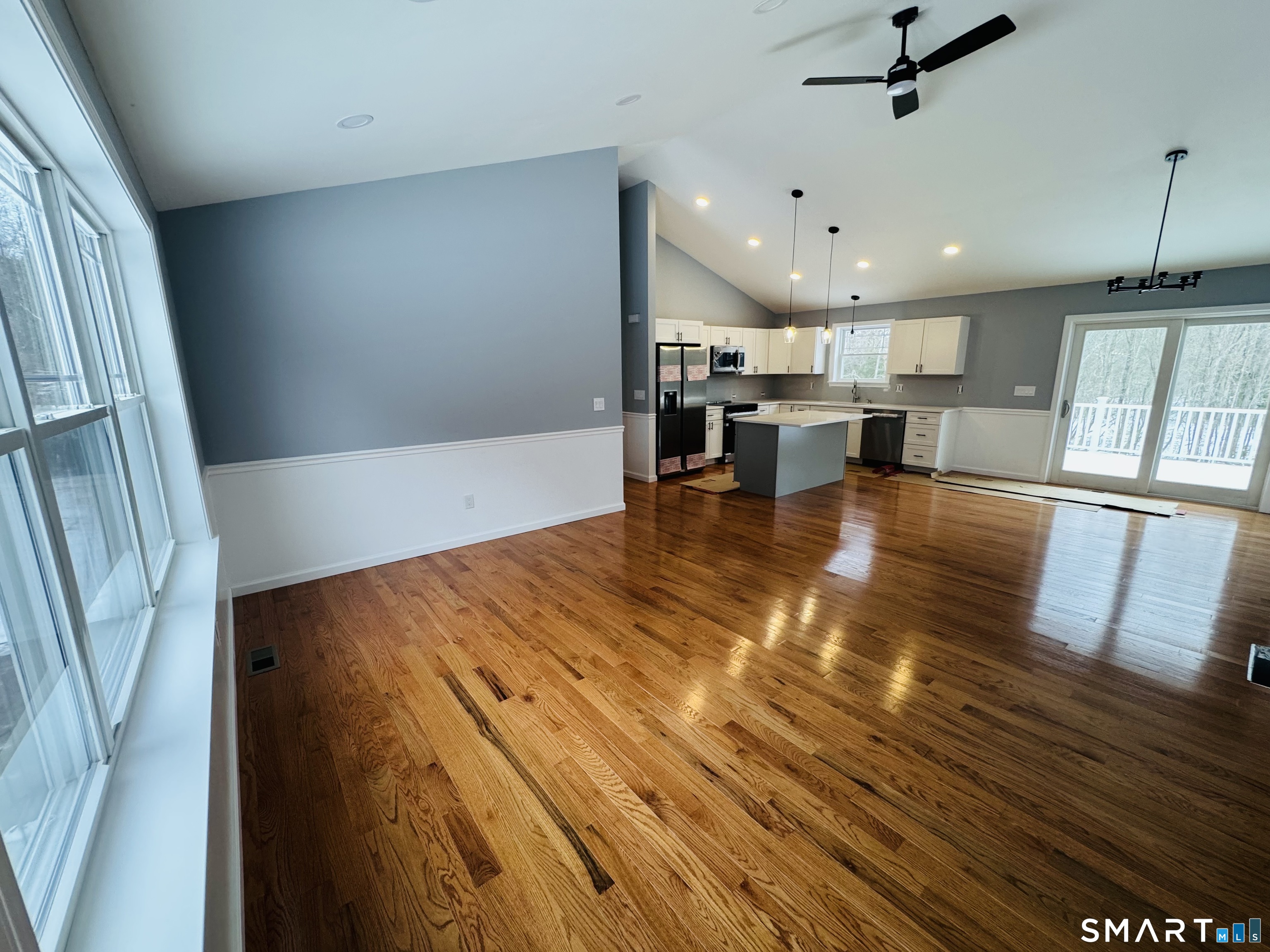 890 Brook Road Scotland, CT 06264 - Photo 14 of 23 a view of kitchen and dining room with wooden floor