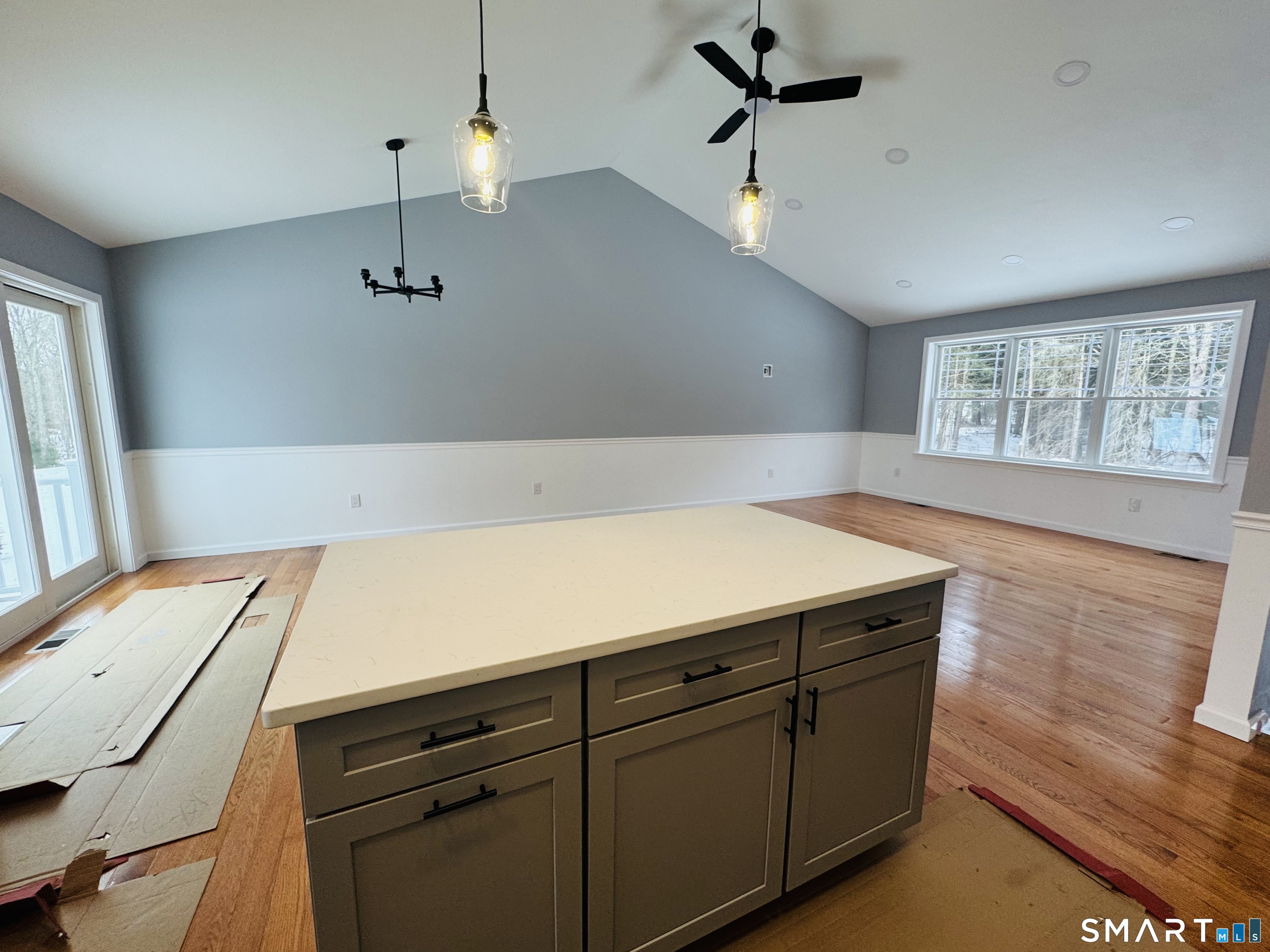 890 Brook Road Scotland, CT 06264 - Photo 2 of 23 a room with cabinets and wooden floor