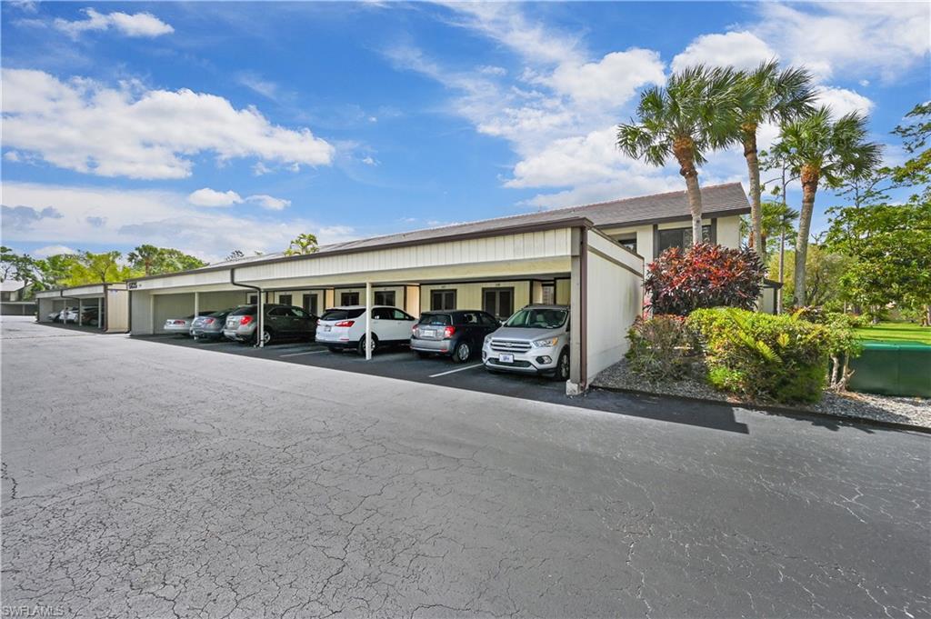 5825 Rattlesnake Hammock Road, Unit 208 Naples, FL 34113 - Photo 6 of 21 Carport