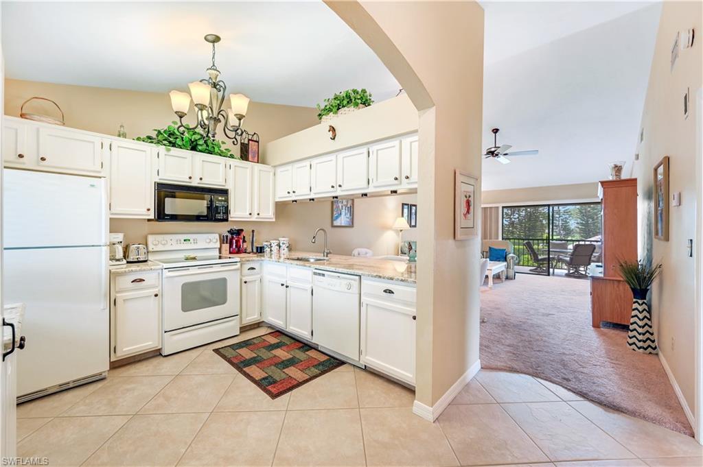 5825 Rattlesnake Hammock Road, Unit 208 Naples, FL 34113 - Photo 9 of 21 Facing SE
