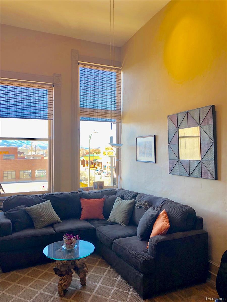 207.5 F Street, Unit 3 Salida, CO 81201 - Photo 4 of 14 a living room with furniture and a large window