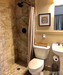 207.5 F Street, Unit 3 Salida, CO 81201 - Photo 7 of 14 a bathroom with a toilet a sink and shower