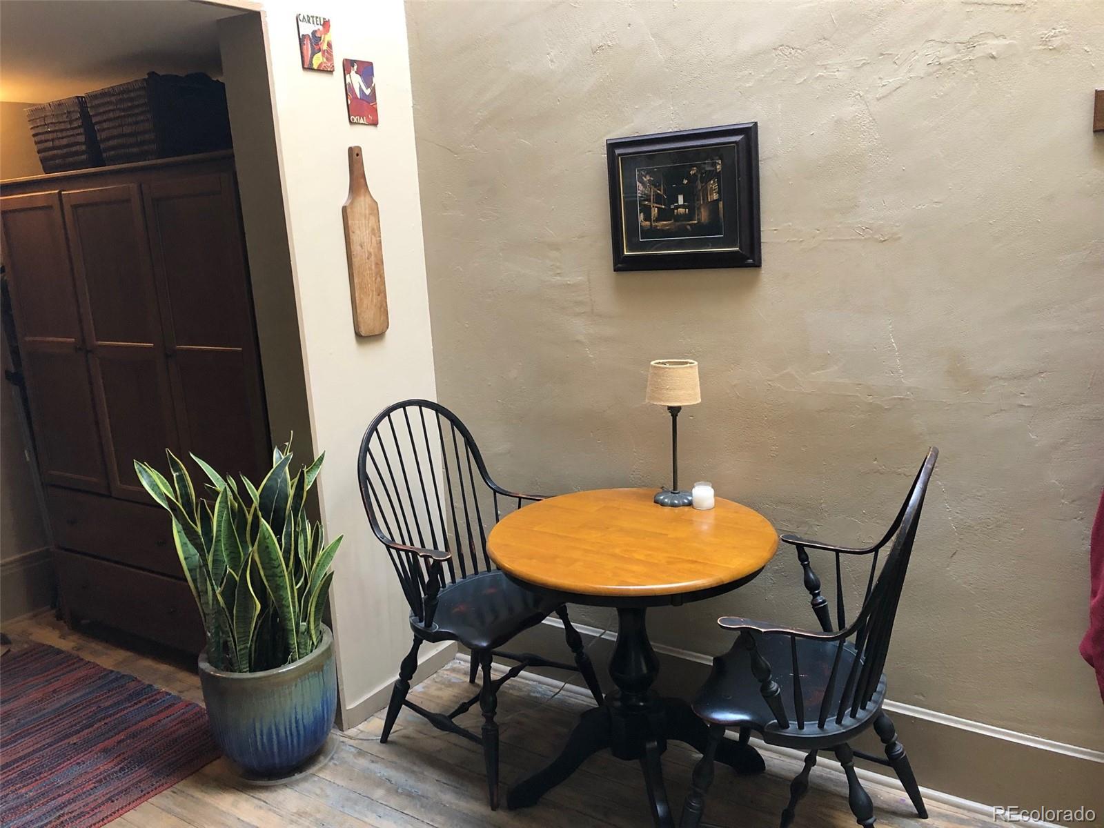 207.5 F Street, Unit 3 Salida, CO 81201 - Photo 8 of 14 a workspace with furniture and a potted plant