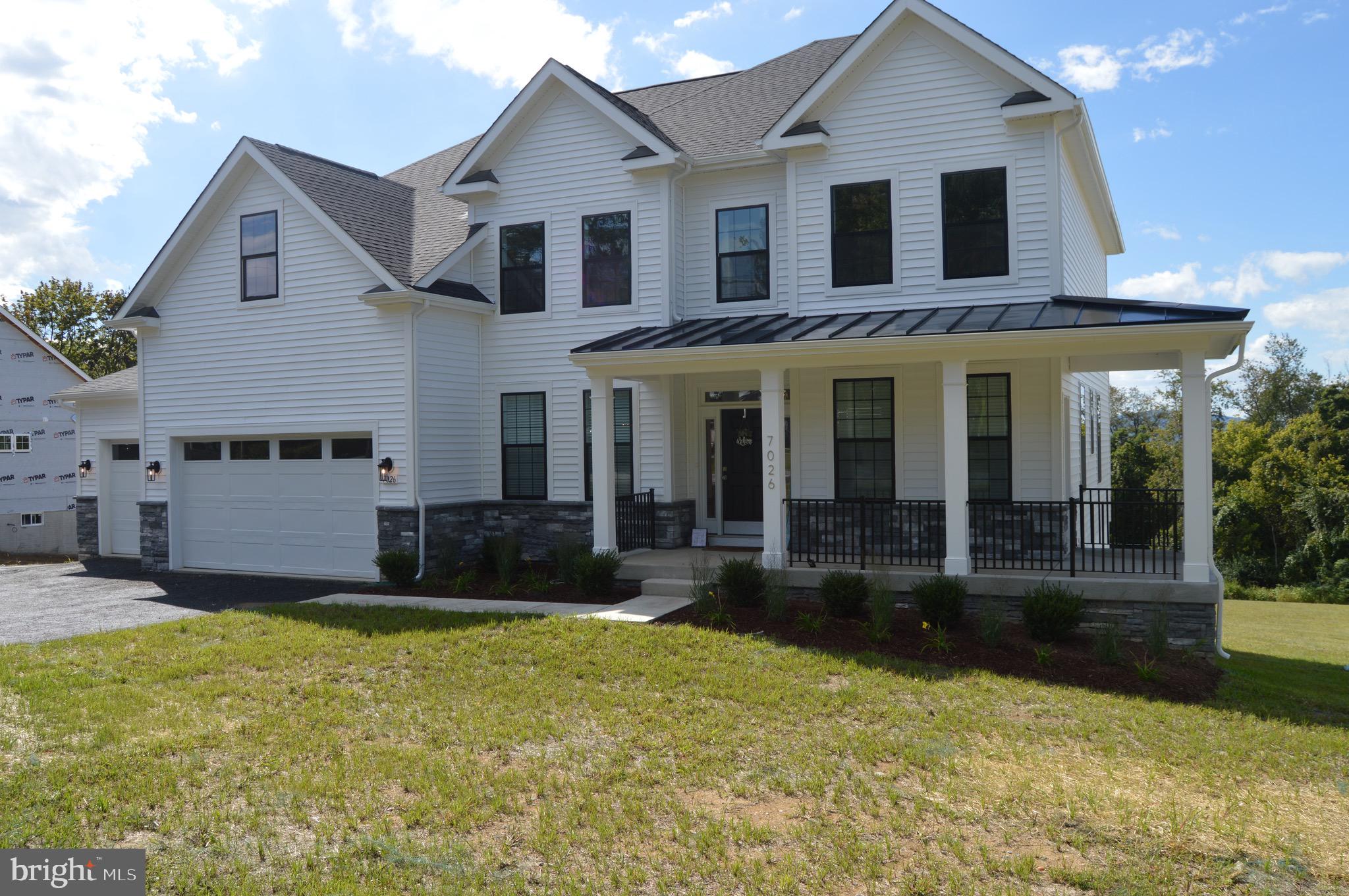New Home w/ 3 car garage & flat lot in rear