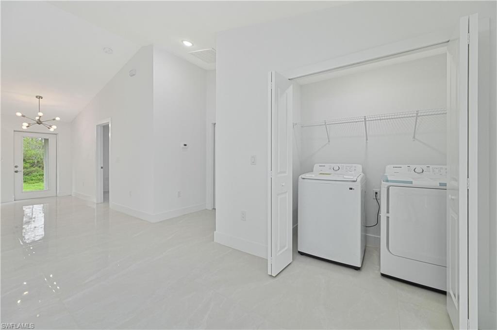 640 Lydia Street Lehigh Acres, FL 33974 - Photo 8 of 26 a view of a room with white doors