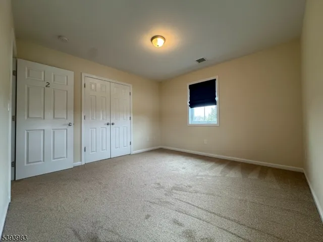 an empty room with an entryway