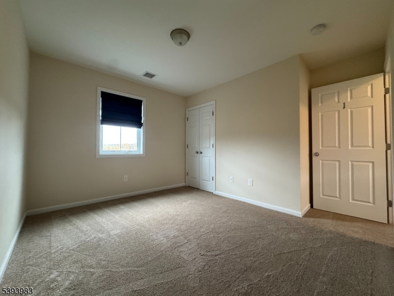 85 Highway 206, Unit A Augusta, NJ 07822 - Photo 25 of 42 an empty room with windows