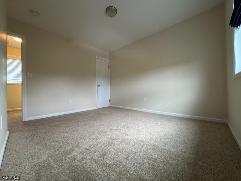 85 Highway 206, Unit A Augusta, NJ 07822 - Photo 27 of 42 an empty room with a empty space and windows