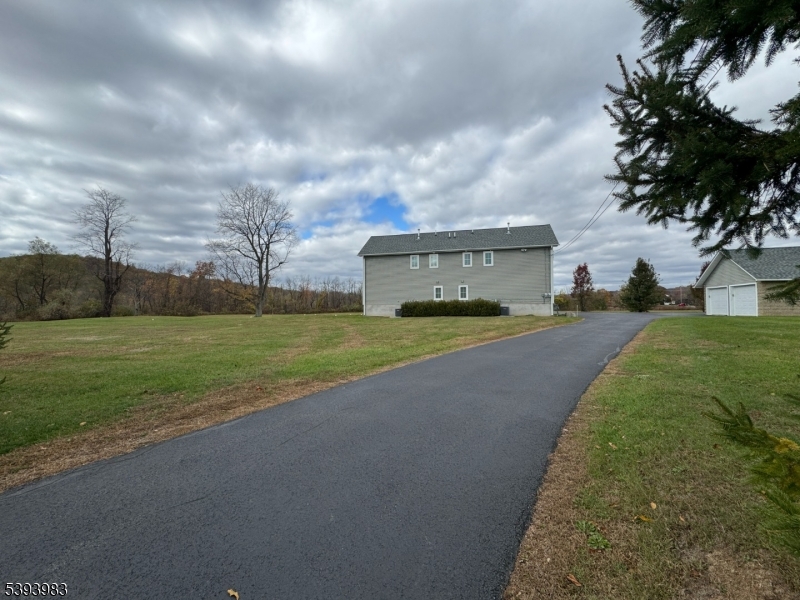85 Highway 206, Unit A Augusta, NJ 07822 - Photo 33 of 42 a view of a big yard with palm trees