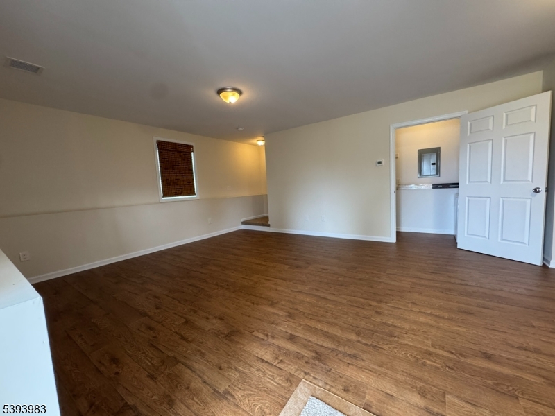 85 Highway 206, Unit A Augusta, NJ 07822 - Photo 5 of 42 a view of empty room with wooden floor
