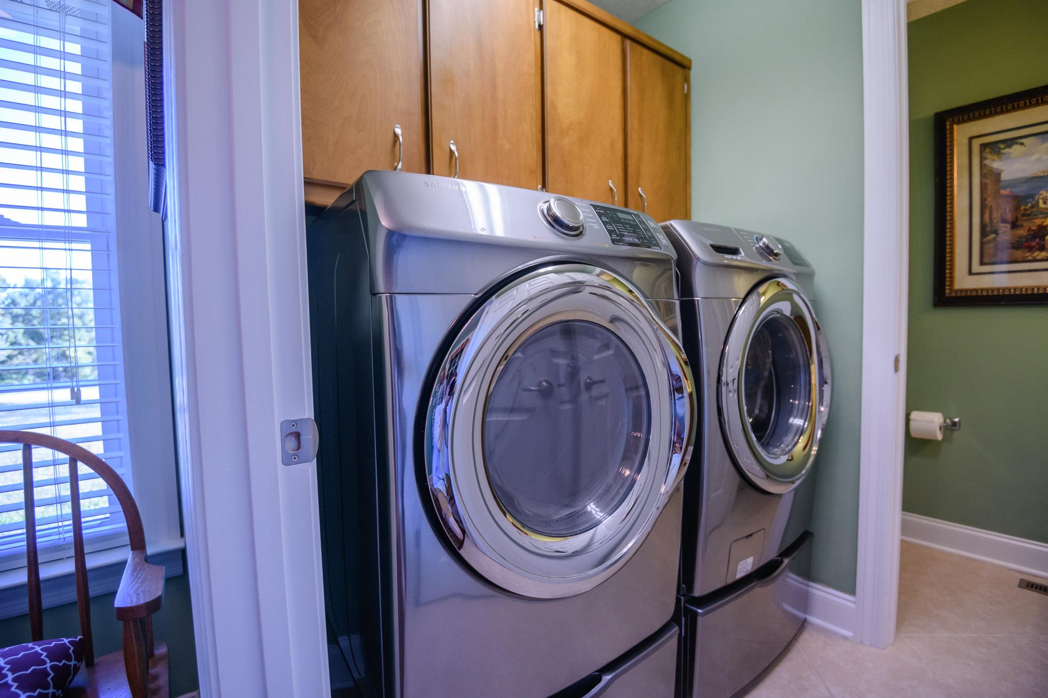 1195 Motlow College Road Normandy, TN 37360 - Photo 24 of 29 Laundry room and guest bathroom with tile flooring