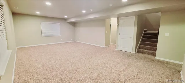 a view of a room that has a window in it