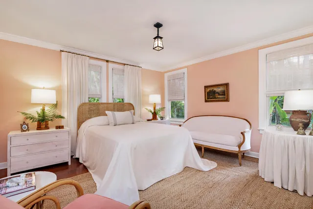 a bed room with a bed and a couch